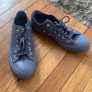 Purple low top converse shoes